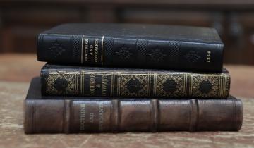 Antique editions of the Doctrine and Covenants, courtesy of Reid Moon. Photograph by Daniel Smith.